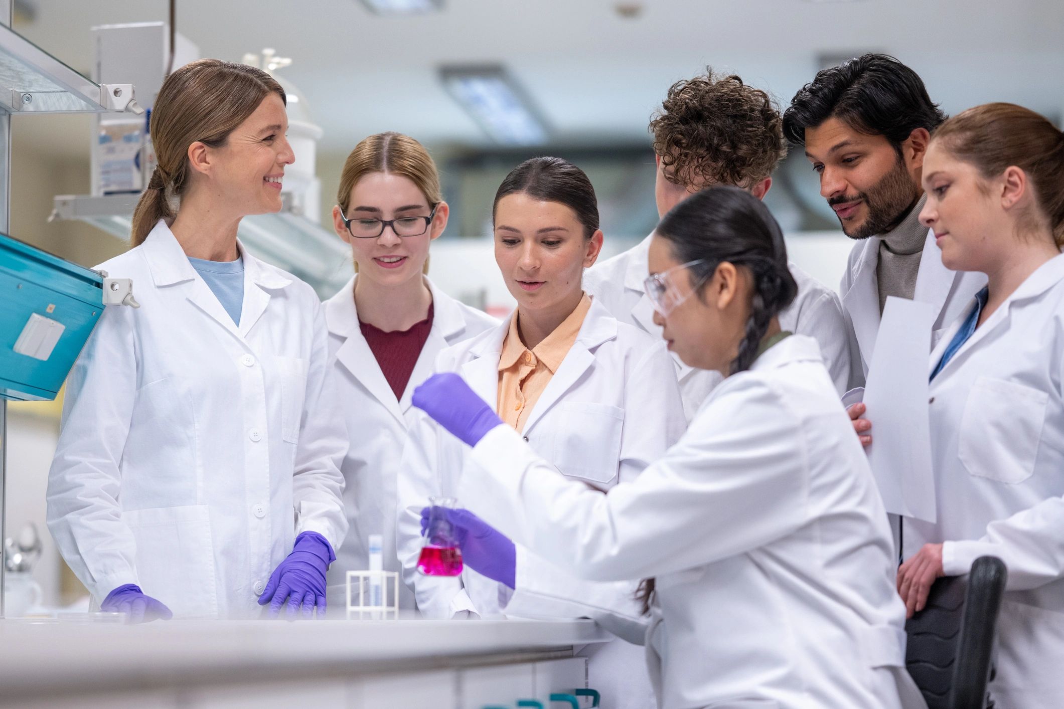Research team collaborating in a modern laboratory